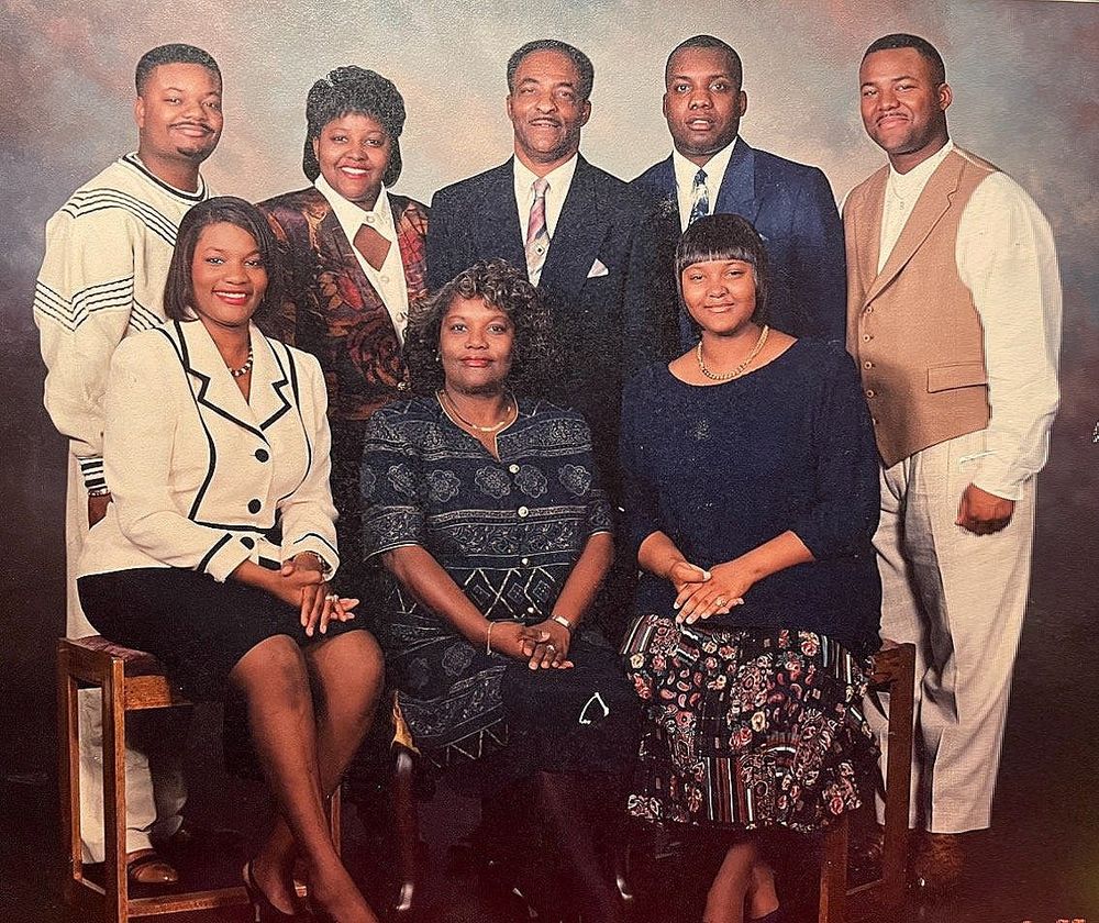 A formal family portrait of eight relatives, 1993